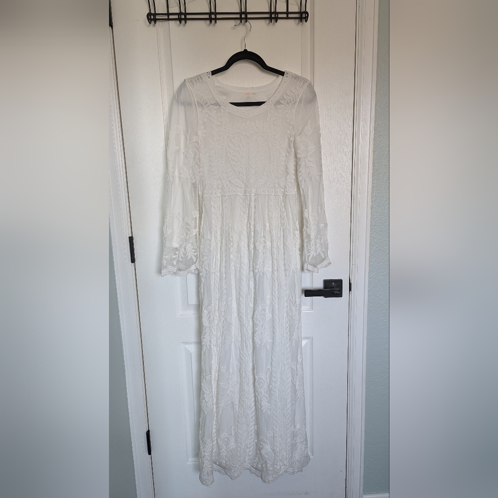 White lace dress with long sleeves